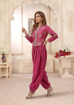 Side angle view of Bellina rose pink jacket and balloon pants